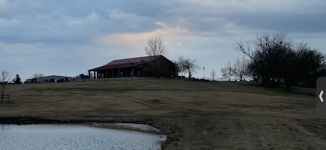 Ranch buildings and barn facilities with lake view